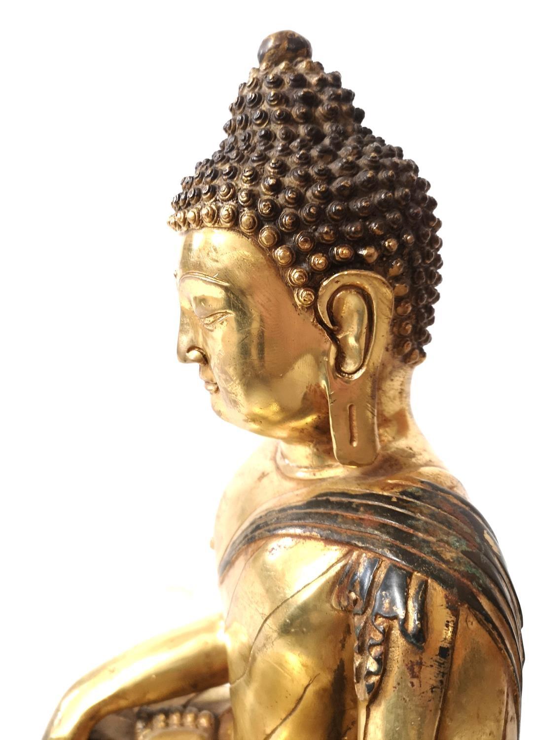 A LARGE CHINESE GILT BRONZE BUDDHA Seated pose on double lotus base - Image 7 of 11