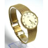 OMEGA, DEVILLE, A GOLD PLATED GENT'S WRISTWATCH Having an octagonal white tone dial and gold