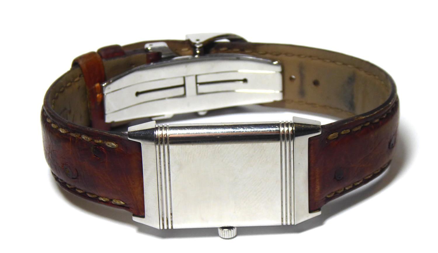 JAGUER LE COULTRE, A GENTLEMAN'S STAINLESS STEEL REVERSO WATCH On tan leather strap, boxed with - Image 5 of 5