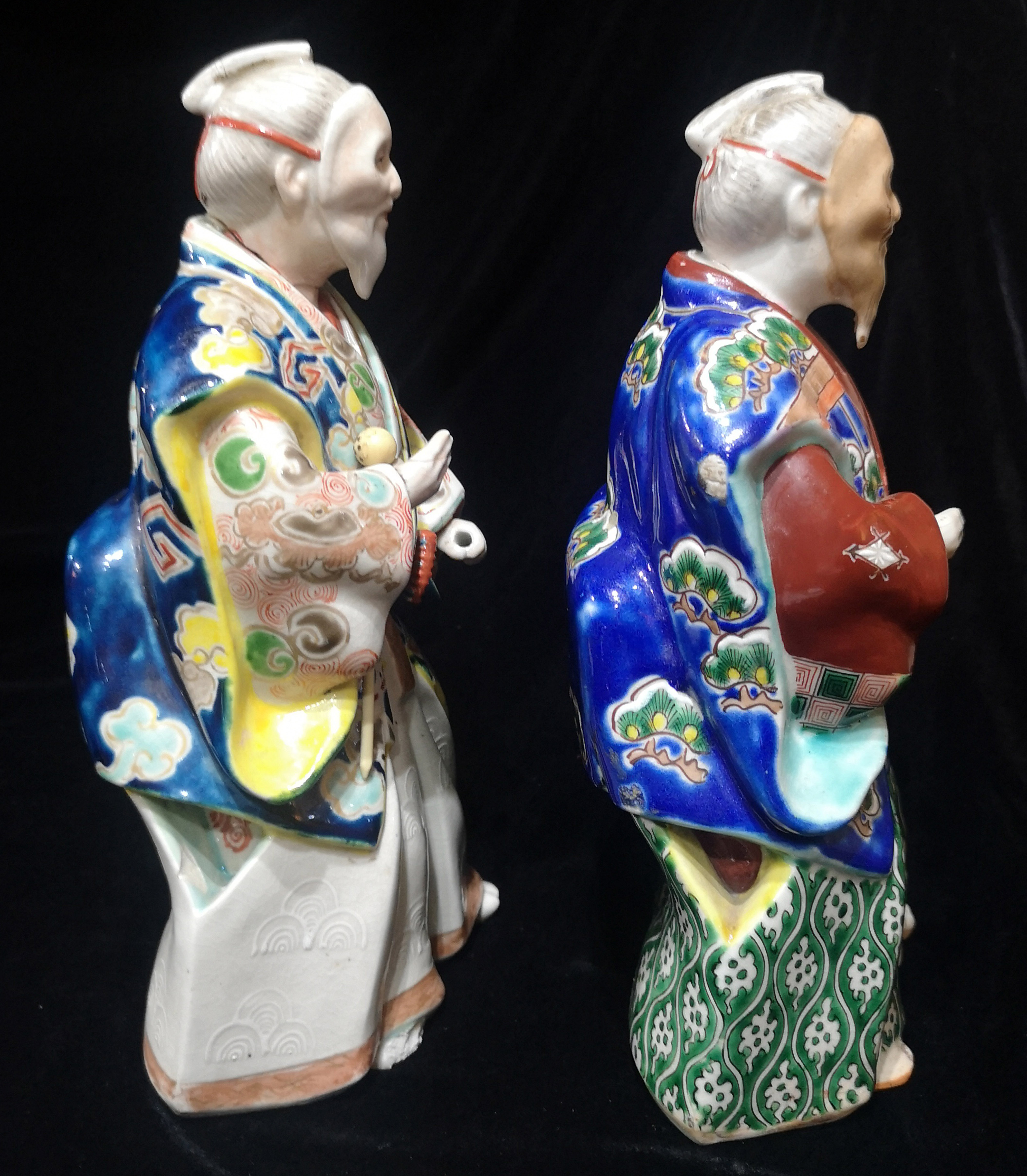 A PAIR OF CHINESE PORCELAIN FIGURINES Elders wearing period clothing with enamel decoration. (approx - Image 5 of 6