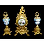 A 19th CENTURY FRENCH SPELTER ORMOLU AND PORCELAIN CLOCK GARNITURE Rococo form with painted