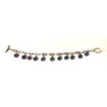 LINKS OF LONDON, A SILVER AND PEARL BRACELET Having eleven black pearls on a silver chain with links