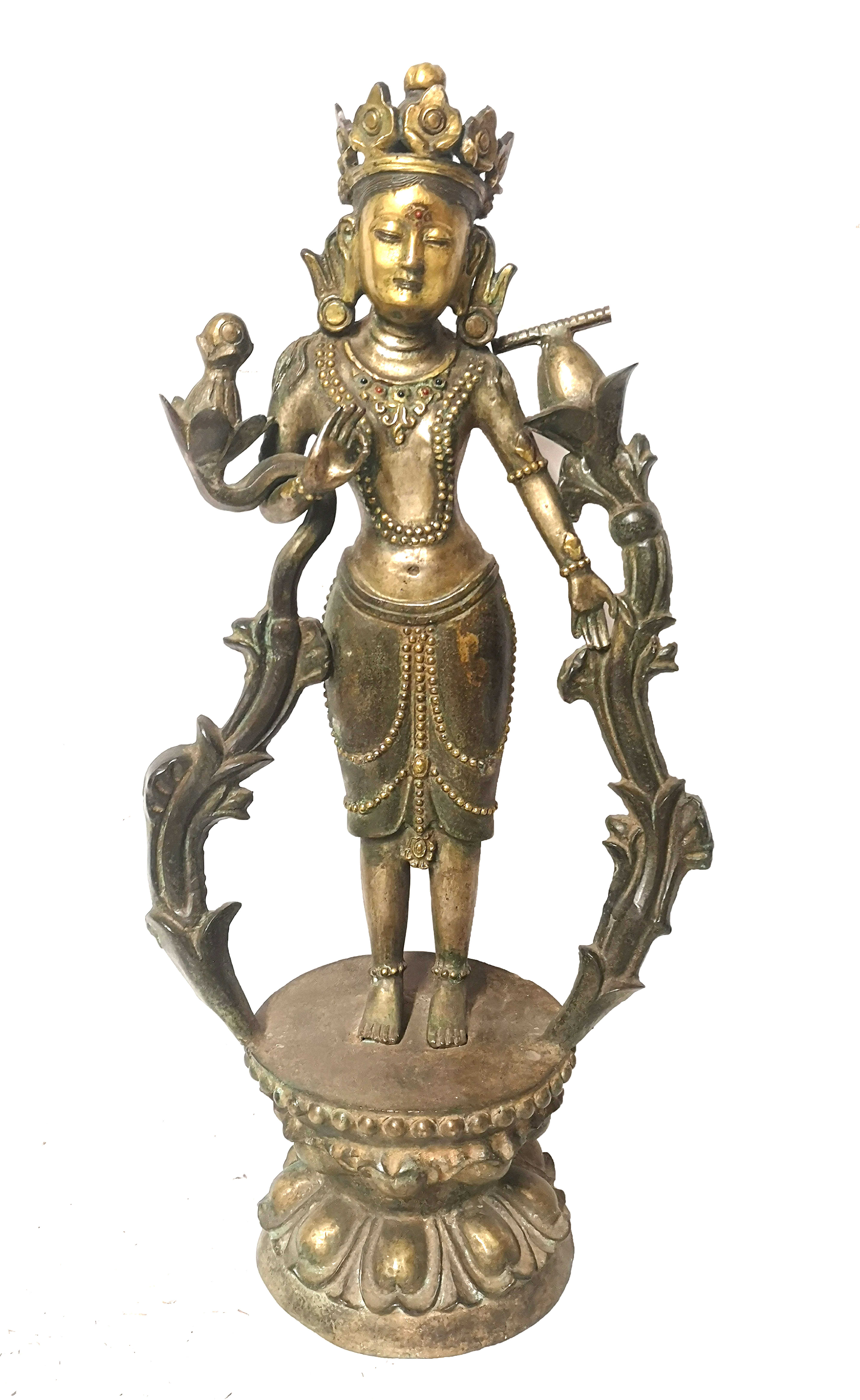 A LARGE TIBETAN BRONZE FIGURE OF A DEITY Standing on a lotus flower base, the collar set with