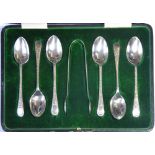 A CASED SET OF EDWARDIAN SILVER TEASPOONS AND SUGAR TONGS Having engraved decoration and fitted