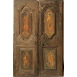 A PAIR OF ANTIQUE INDIAN DOORS The ogee panels painted with Hindu gods. 100 x 155 cm