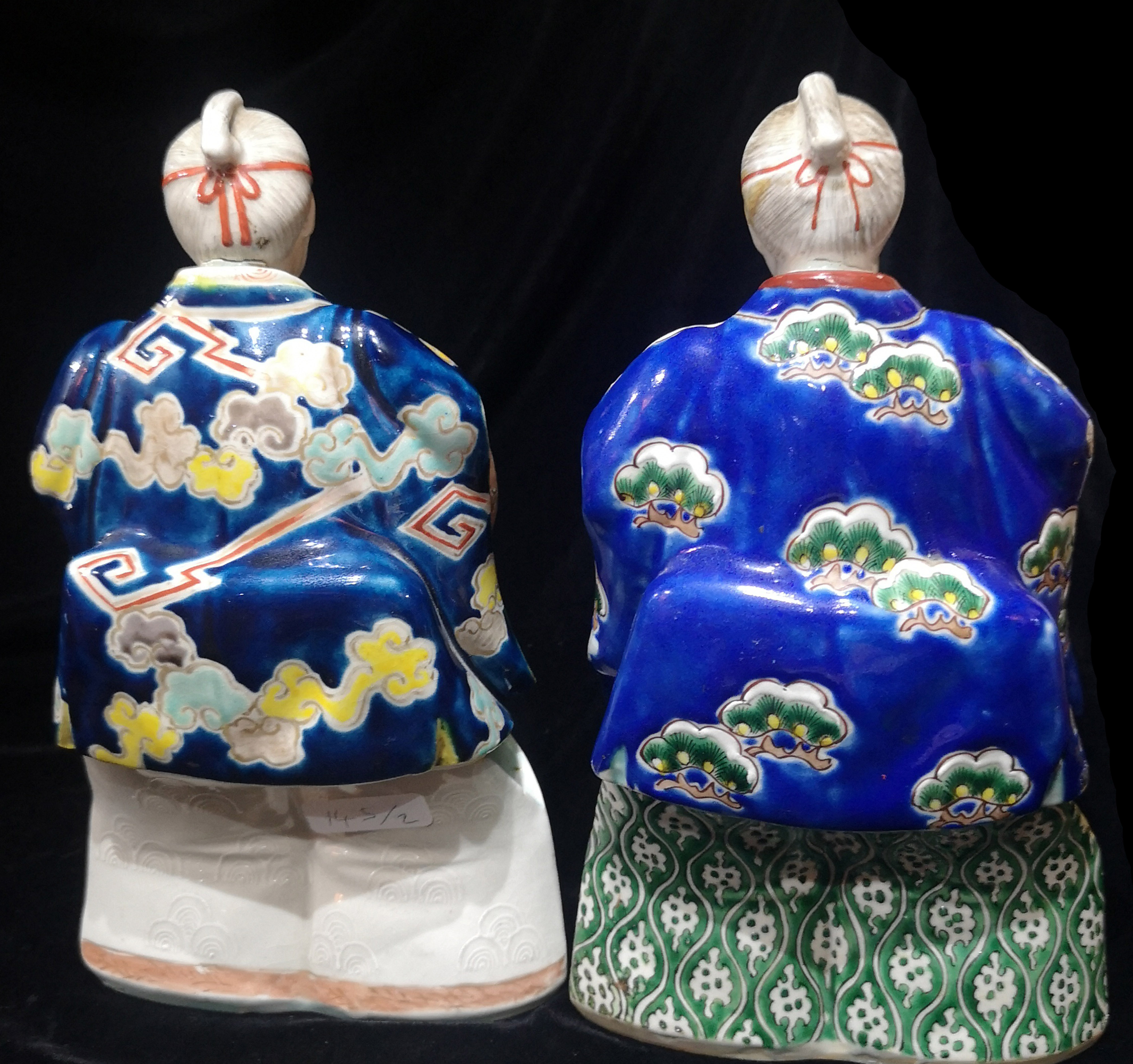 A PAIR OF CHINESE PORCELAIN FIGURINES Elders wearing period clothing with enamel decoration. (approx - Image 4 of 6