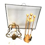 A SET OF BRASS FIRE IRONS Along with a brass lantern chandelier and a speed guard.