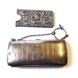 A VICTORIAN SILVER CALLING CARD CASE Rectangular form with embossed decoration, hallmarked