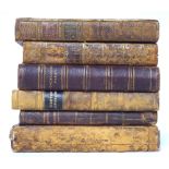 A COLLECTION OF SIX 18TH CENTURY LEATHER BOUND BOOKS Including scriptures illustrated, the seasons