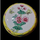 A CANTON ENAMEL ON SPHERICAL COPPER BOX Decorated with flowers and insects in yellow ground. (approx