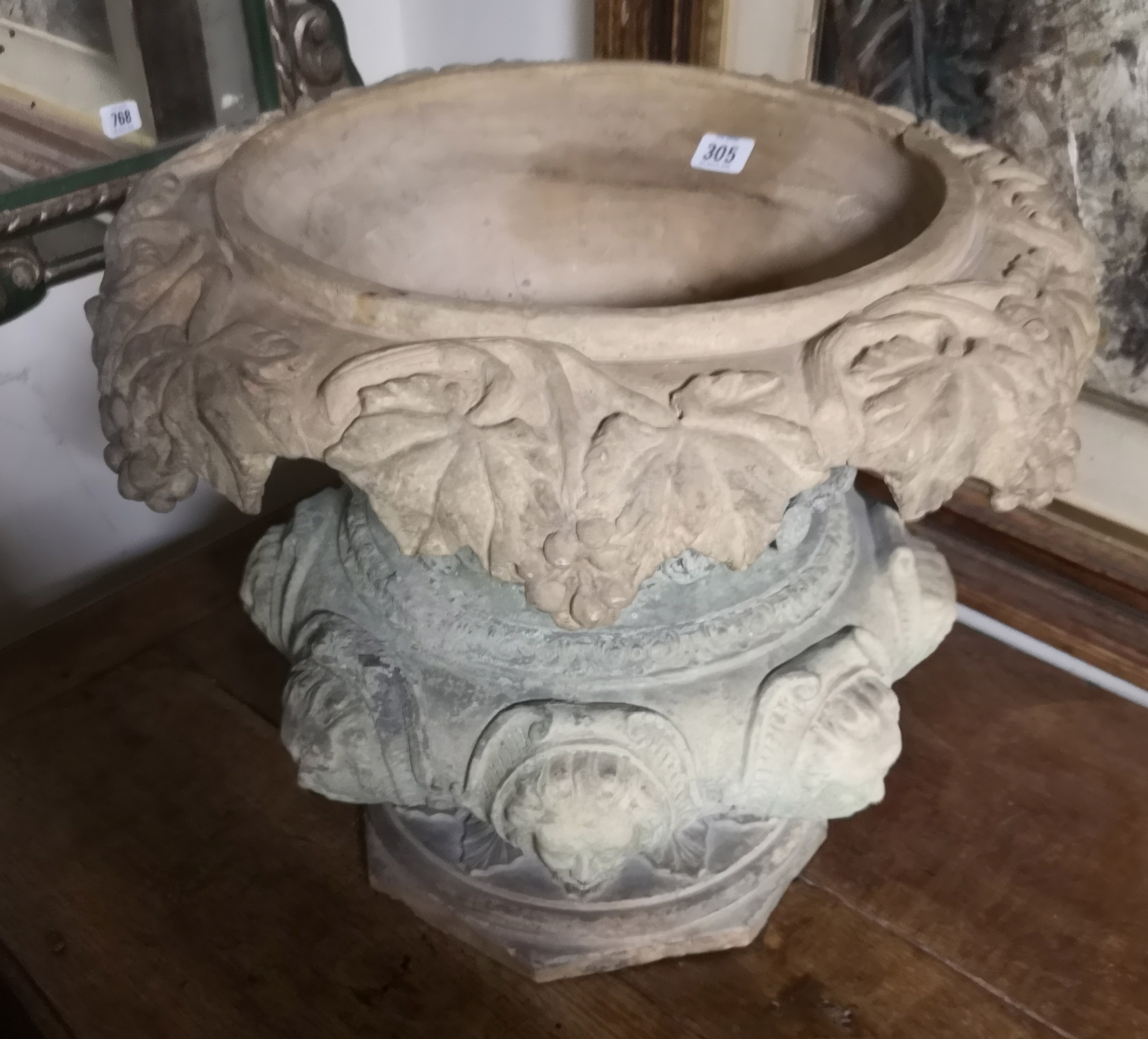 A TERRACOTTA PLANTER With grape and vine draped collar above eight facial masks. (diameter 50cm x - Image 2 of 2