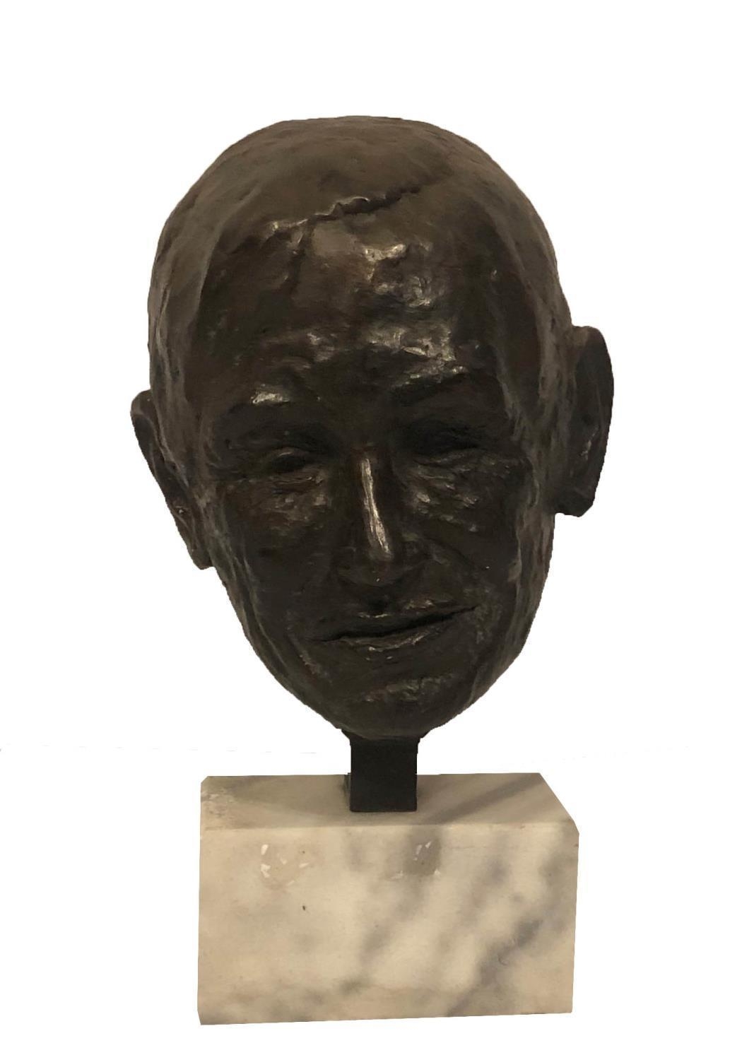 PROFESSOR STEVEN HAWKIN, A LIFE SIZE BRONZE PORTRAIT BUST Indistinctly signed, on a white marble