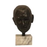 PROFESSOR STEVEN HAWKIN, A LIFE SIZE BRONZE PORTRAIT BUST Indistinctly signed, on a white marble