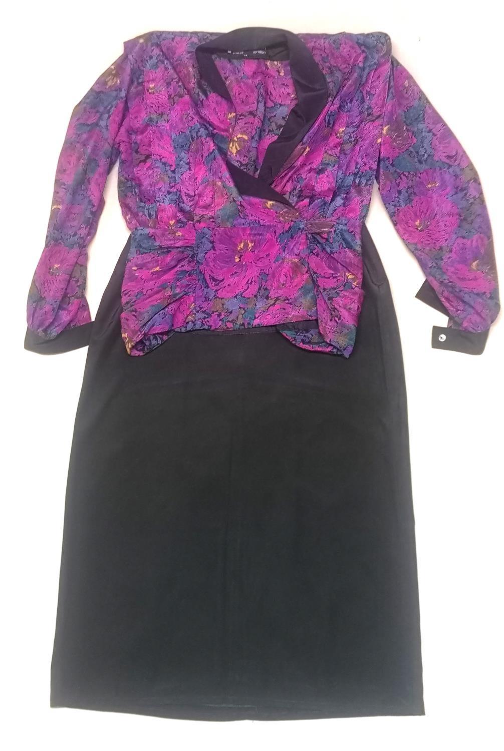 PIERRE CARDIN, A VINTAGE JACKET AND SKIRT SET Having a purple floral design with plain black