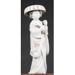 A LATE 19TH/EARLY 20TH CENTURY JAPANESE IVORY OKIMONO GEISHA CARVING. Meiji period, signed. (h 18cm)