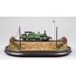 A 20TH CENTURY STEAM TRAIN MODEL DIORAMA UPON VICTORIAN EBONISED PLINTH. (l 28cm)