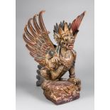 A LARGE 19TH CENTURY INDONESIAN GARUDA TEMPLE GUARDIAN CARVED STATUE. (h 73cm x w 45cm x d 50cm)