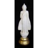 AN 18TH CENTURY BURMESE ORIENTAL CARVED ALABASTER BUDDHA Standing pose in gilt wood socle. (approx