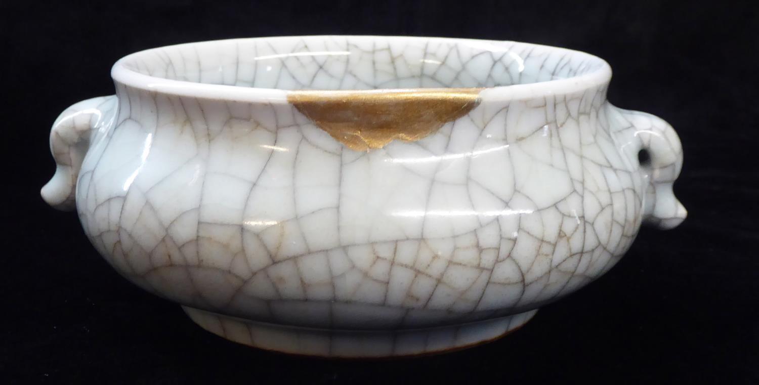 A LATE 18TH/EARLY 19TH CENTURY CHINESE CELADON CRACKLE GLAZE CENSER Having twin handles and gilt