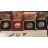 A COLLECTION OF FOUR CASED 20TH CENTURY SILVER PROOF CROWN COINS Comprising The Queen Mother?s