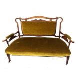 AN EDWARDIAN ROSEWOOD AND MARQUETRY INLAID TWO SEAT SETTEE In green velvet upholstery, on square