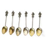 A SET OF SIX 19TH CENTURY SCOTTISH SILVER APOSTLE SPOONS Each having a figural finial and twisted