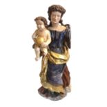 AN 18TH CENTURY CARVED AND PAINTED WOODEN ECCLESIASTICAL MADONNA AND CHILD SCULPTURE Wall mounted