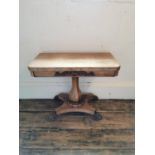 A WILLIAM IV BLEACHED ROSEWOOD FOLD OVER CARD TABLE With red circular playing surface raise on a