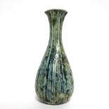 MARTIN BROTHERS, BRITISH, ESTABLISHED 1873, A STONEWARE GLAZED SLENDER NECK VASE With ribbed body,