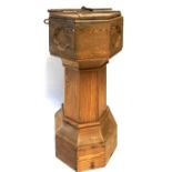 A VICTORIAN PITCH PINE FONT AND COVER With two section zinc liner, on faceted column. (50cm x 50cm x