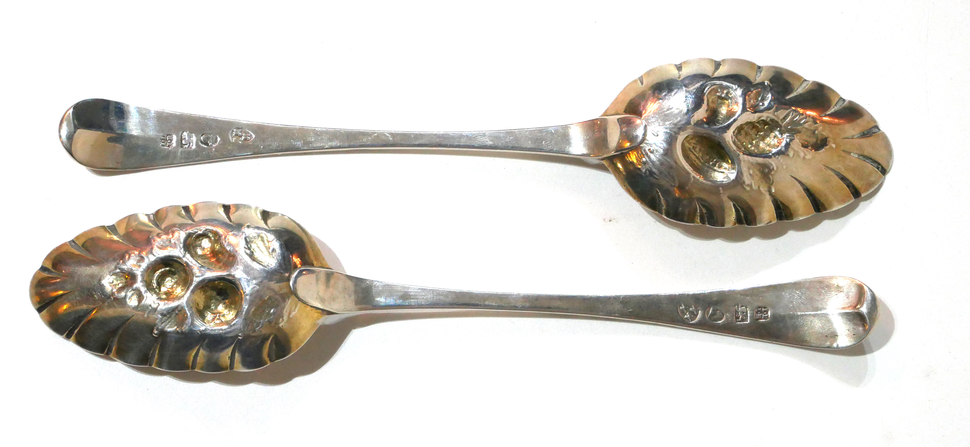 A PAIR OF GEORGIAN NEWCASTLE SILVER BERRY SPOONS Having fine engraved decoration and embossed - Image 2 of 3