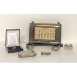 A COLLECTION OF HALLMARKED SILVER ITEMS To include desk calendar, vesta, card case ,napkin holder