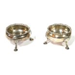 A PAIR OF VICTORIAN SILVER TABLE SALTS Circular form with tripod legs, hallmarked London, 1841. (