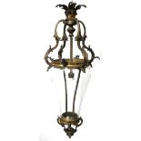 19TH CENTURY FRENCH GILT BRONZE HALL LANTERN With scrolling leaf decoration and shape glass. (drop