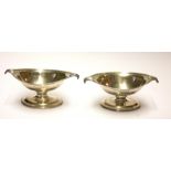 A PAIR OF GEORGIAN SCOTTISH SILVER NAVETTE FORM SALTS With twin reeded handles, hallmark Thistle