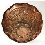 AN ARTS AND CRAFTS COPPER TRAY Along with a copper bowl, indistinctly stamped. (largest diameter