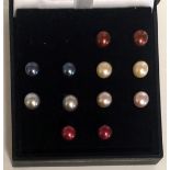 SIX PAIRS OF PEARL EARRINGS Various colours.