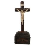 A MID 19TH CENTURY CHIP CARVED CRUCIFIX With an earlier ivory Corpus (probably Dieppe carving). (h
