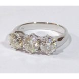 AN 18CT WHITE GOLD RING SET WITH THREE DIAMONDS (size M). (total 2.44ct) (colour H, S3)
