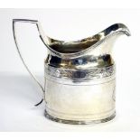 A GEORGIAN SILVER CLASSICAL FORM CREAM JUG With fine engraved decoration, hallmarked London,