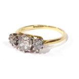 AN EARLY 20TH CENTURY THREE STONE DIAMOND RING Graduating old cut stones (size L). (approx total