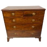 AN EARLY 19TH CENTURY SOLID MAHOGANY AND INLAY CHEST With two short over three long drawers