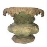 A TERRACOTTA PLANTER With grape and vine draped collar above eight facial masks. (diameter 50cm x