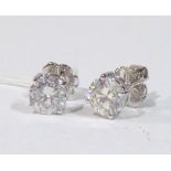 A PAIR OF 18CT WHITE GOLD DIAMOND STUD EARRINGS. (total weight 1.35ct)