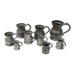 A COLLECTION OF VICTORIAN PEWTER TANKARDS Two marked' James Yates', with various touch marks. (