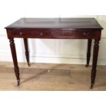 IN THE MANNER OF GILLOW, A 19TH CENTURY MAHOGANY SIDE/WRITING TABLE With two drawers, raised on