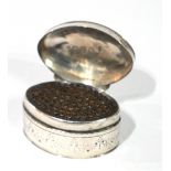 A GEORGIAN SILVER NUTMEG OVAL GRATER With engraved decoration, interior grill and hinged compartment