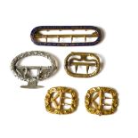 A COLLECTION OF 19TH CENTURY GILT METAL SHOE BUCKLES Including a pair with embossed decoration, a