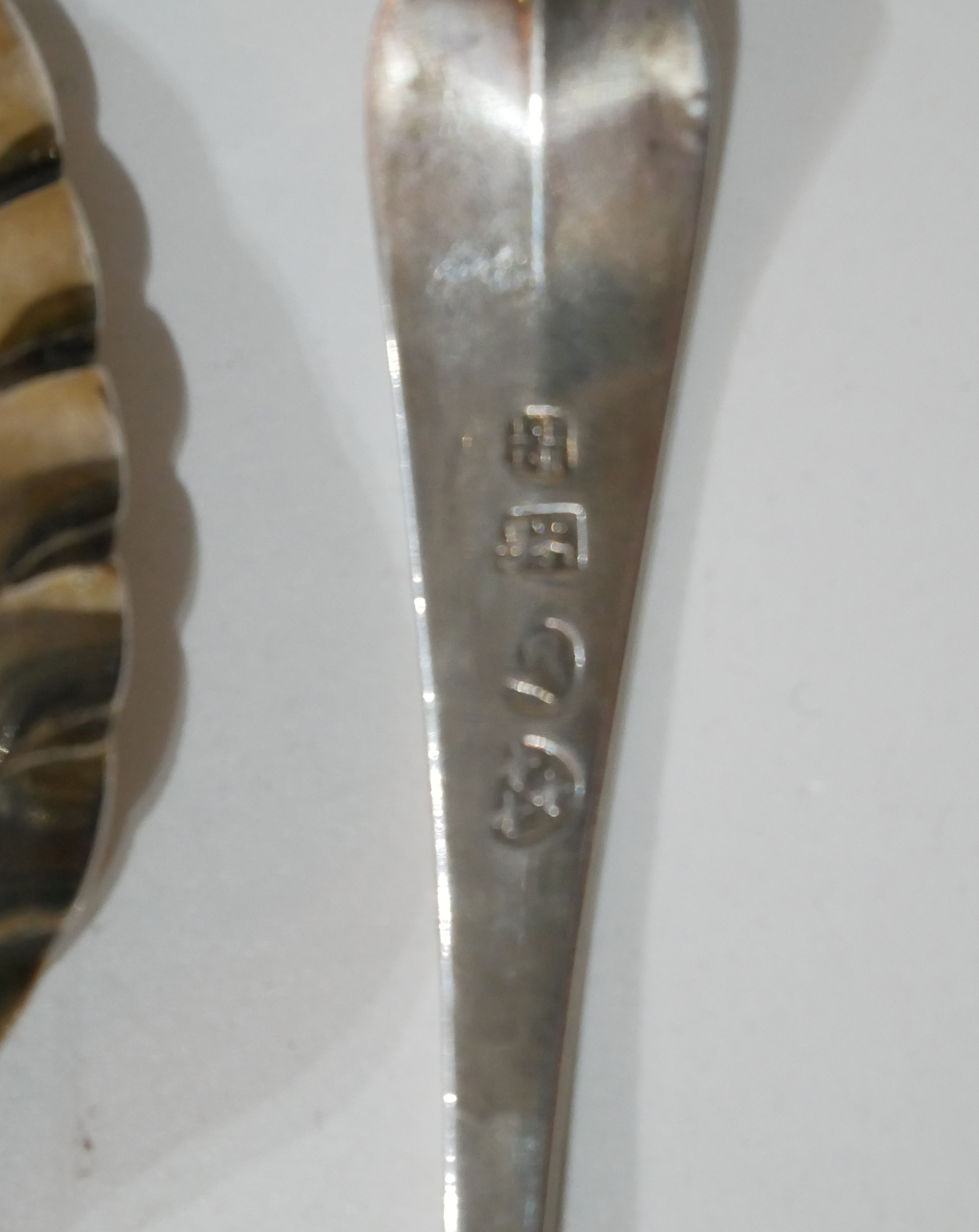 A PAIR OF GEORGIAN NEWCASTLE SILVER BERRY SPOONS Having fine engraved decoration and embossed - Image 3 of 3