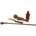 A COLLECTION OF VICTORIAN TREEN ITEMS Comprising a wig stand, flask, swagger stick and two medical